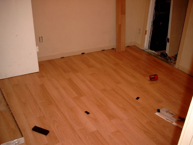 CLICK HERE for more photos of the bed room wood floor